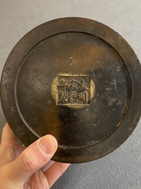 A Chinese bronze censer with mythical beast head handles, Xuande mark, Kangxi