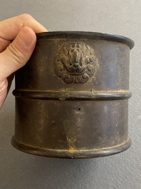 A Chinese bronze censer with mythical beast head handles, Xuande mark, Kangxi