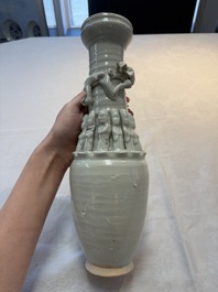 Two Chinese qingbai-glazed urns with applied design, Song
