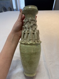 Two Chinese qingbai-glazed urns with applied design, Song