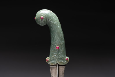 A fine Mughal dagger with a ruby- and gold-inlaid celadon jade hilt, 18th C.