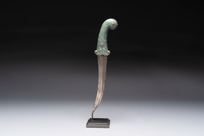 A fine Mughal dagger with a ruby- and gold-inlaid celadon jade hilt, 18th C.