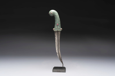 A fine Mughal dagger with a ruby- and gold-inlaid celadon jade hilt, 18th C.